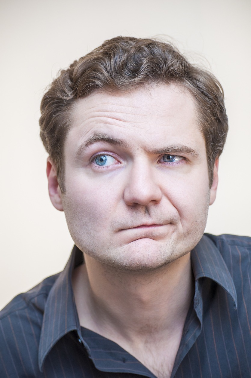 Portrait of young with tight mouth