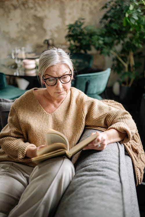 Elderly woman reading