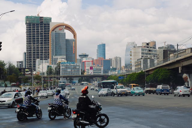 people in black motorcycles on the road