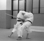 Disarming an attacker using a sword taking technique.