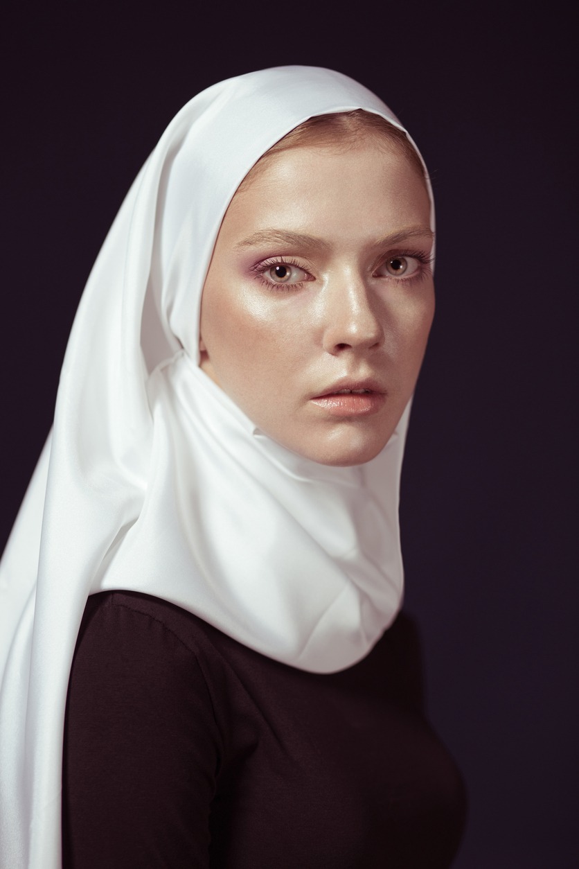 A portrait of a young nun